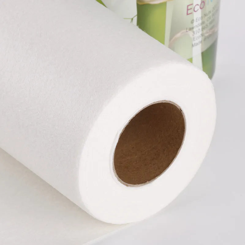 Reusable bamboo kitchen paper towel roll on countertop, absorbent and washable cloth alternative to disposable towels