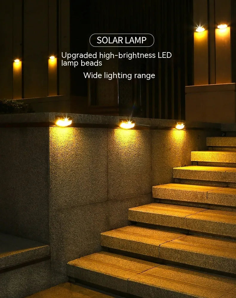 Solar outdoor garden wall lamp with smiling face design for courtyard lighting