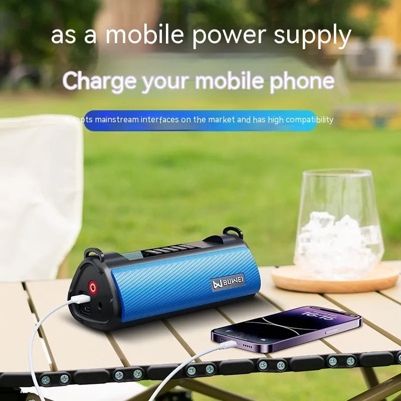 Portable car air pump with black ABS body, USB charging cable, and LED light on a dark surface