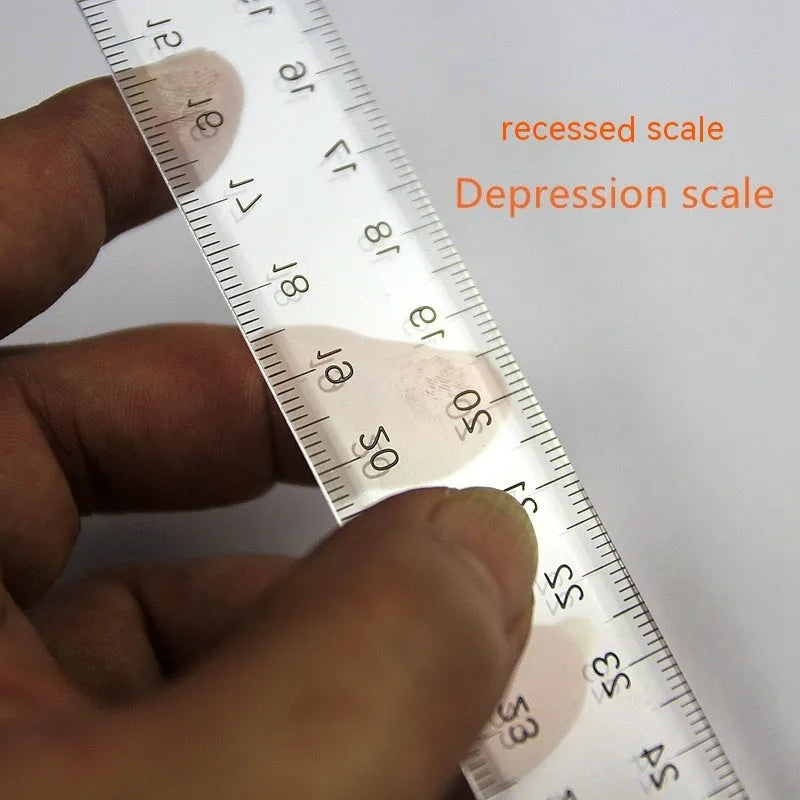 Transparent plastic T-shaped technical drawing ruler showing British centimetre graduations