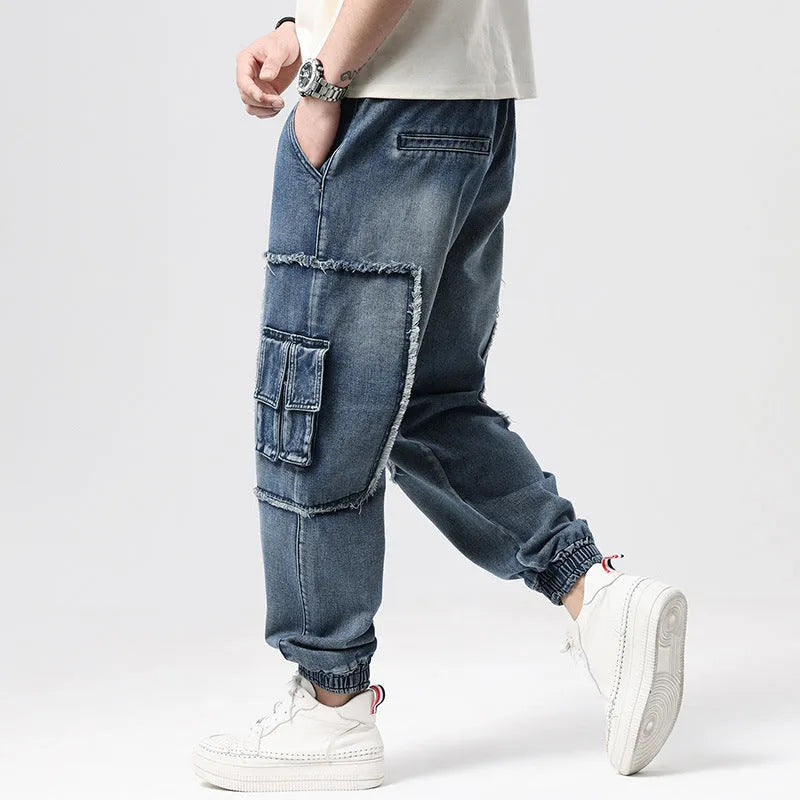 Hip hop retro multi-pocket denim pants in high waist loose fit, front view showing multiple pockets and straight leg style