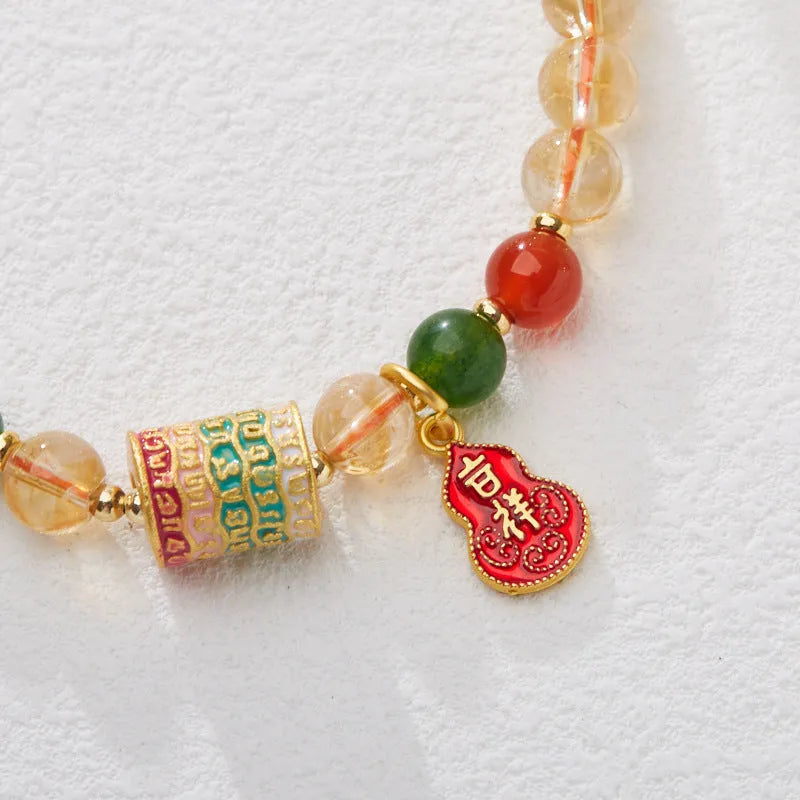 Hand-woven citrine five sutra bracelet with 6mm crystals in geometric braided pattern