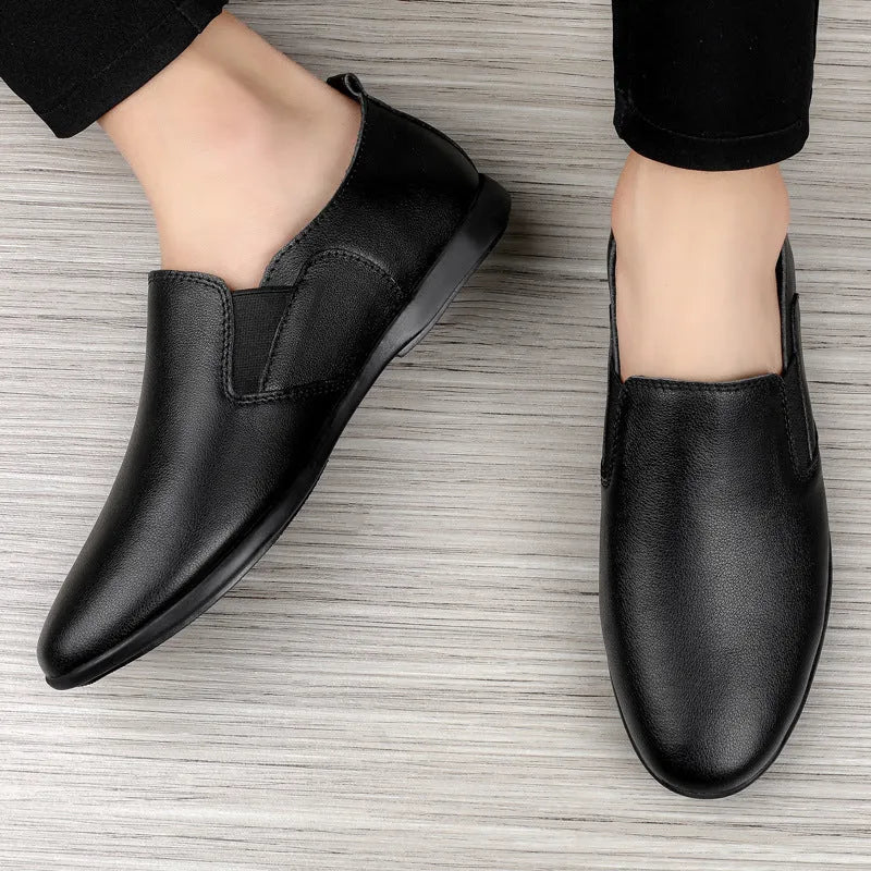 Men's black cowhide leather round toe business casual shoes on a white background