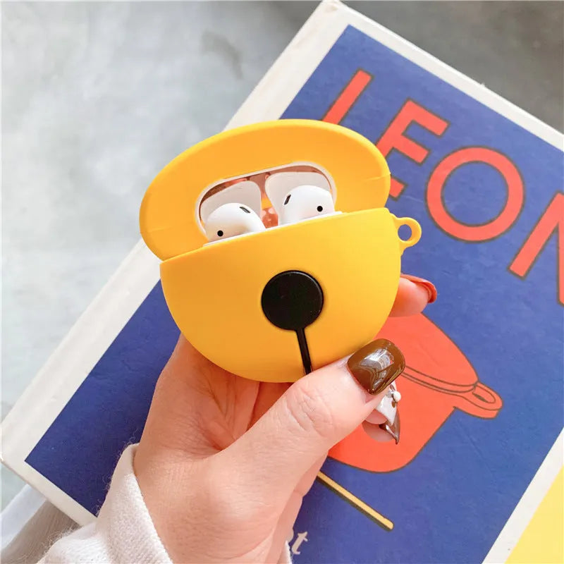 Bright yellow silicone case with a bell charm for Apple AirPods 1 and 2 generation.