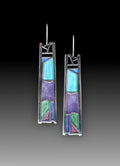 Water drop irregular oil color silver alloy women's drop earrings on white background