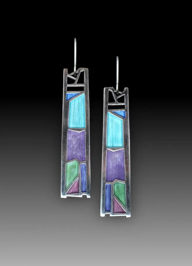 Water drop irregular oil color silver alloy women's drop earrings on white background