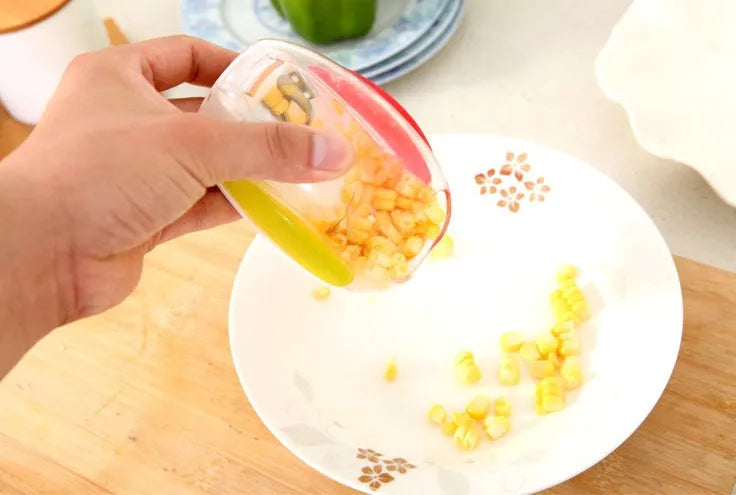 Kitchen Gadgets Peel Corn Separator with plastic shell and wavy stainless steel blade for removing corn kernels from cob