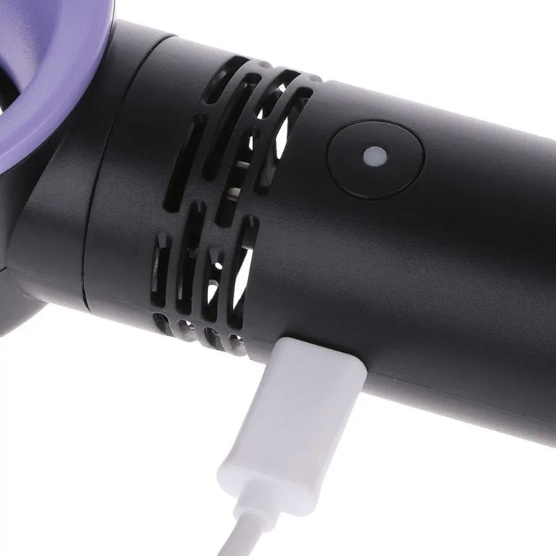 Portable bladeless fan in white with USB charging cable, base, and three speed settings
