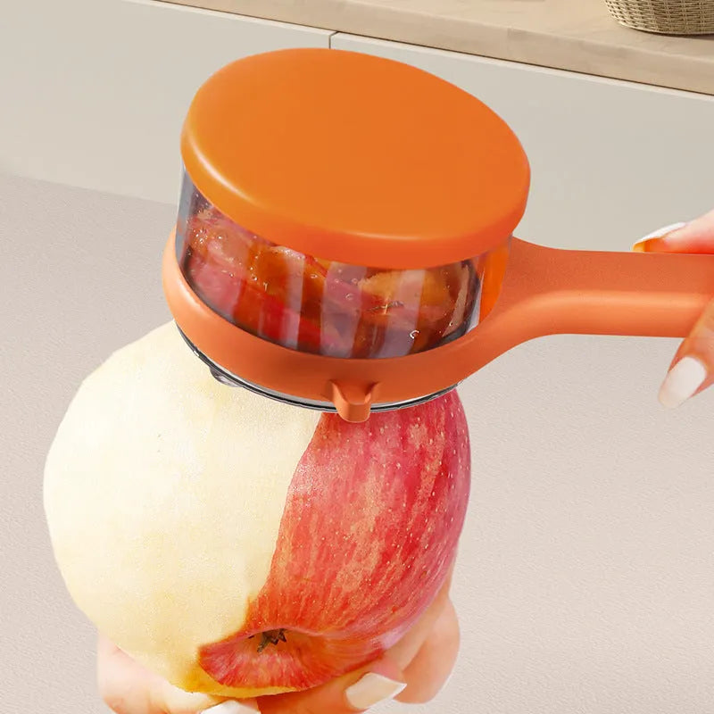 Kitchen multi-functional peeler with bucket storage in light green and orange colours, food-grade plastic construction
