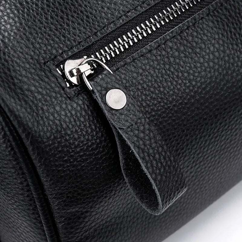 Black genuine leather one-shoulder crossbody bag with large capacity.