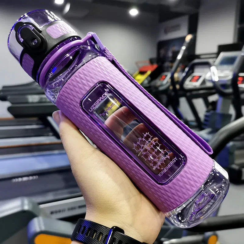 Portable sport water bottle in blue, copolymer polyester plastic, 1100ml capacity, with black cap.
