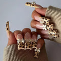 Leopard print butterfly design nail art stickers on a white background, WM296 colour.