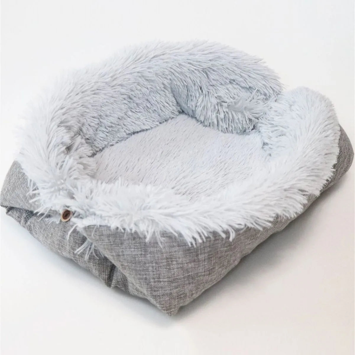Gray self-heating pet blanket nest with long plush fur and non-slip black bottom, 61x51 cm