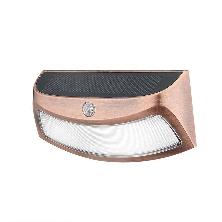 Solar outdoor garden wall lamp with smiling face design for courtyard lighting