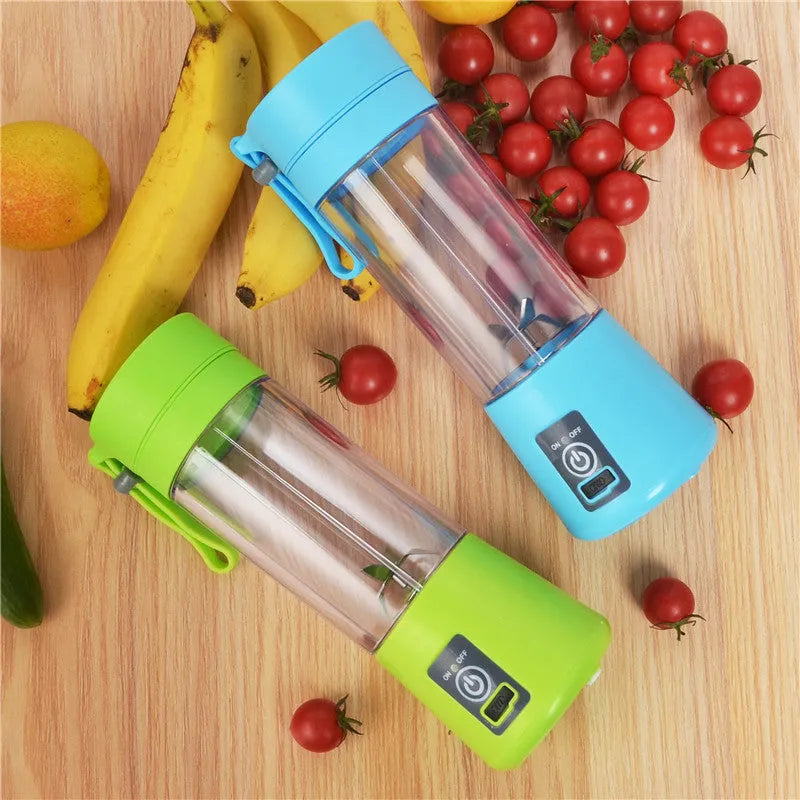 Mini USB electric centrifugal juicer with stainless steel blade, anti-slip base, and rope handle in blue plastic housing