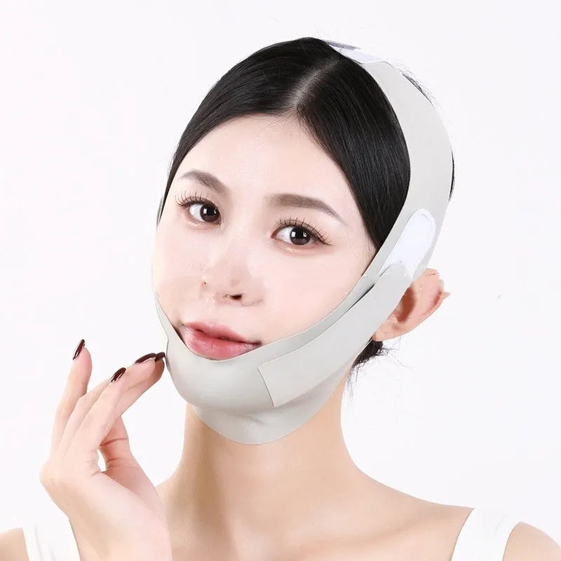 Graphene face shaping mask with lifting and tightening bandage in breathable fabric