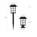 Black solar outdoor LED lawn light with decorative windows, IP65 waterproof, placed in a garden