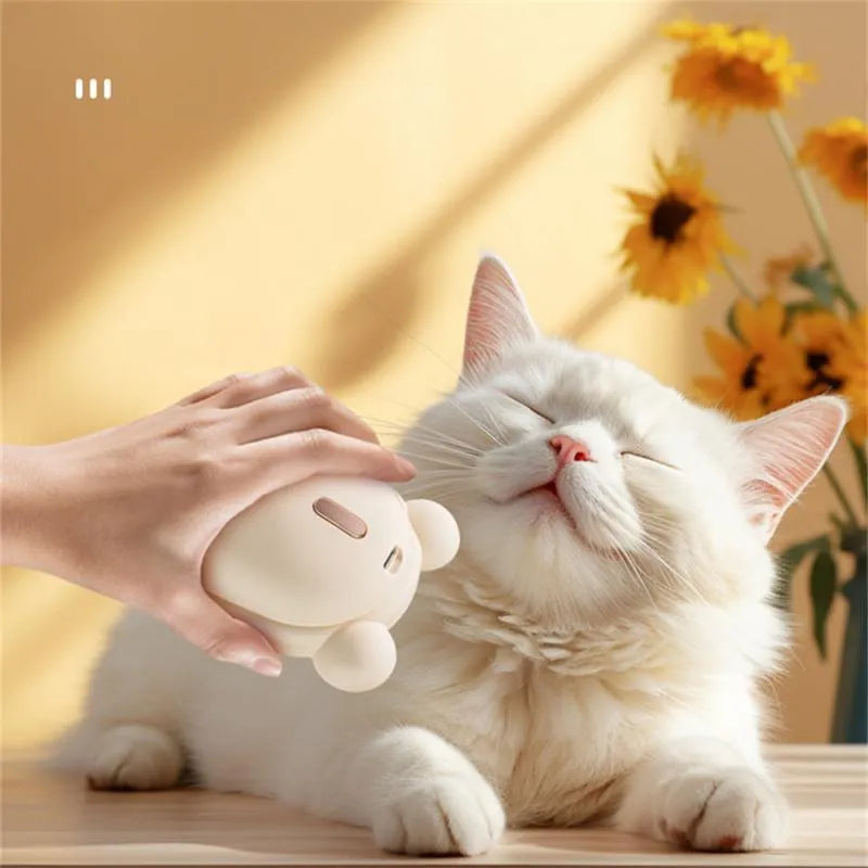 Pink and yellow 3-in-1 pet grooming brush with removable comb and spray function