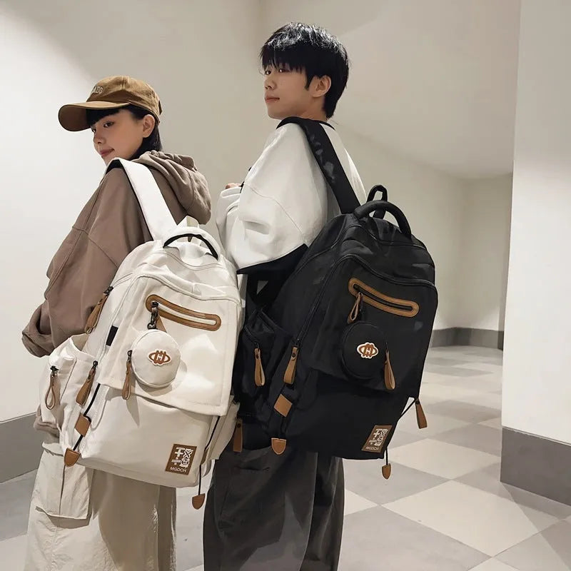 Large nylon school backpack for junior high school students with curved shoulder straps, shown in a solid colour.