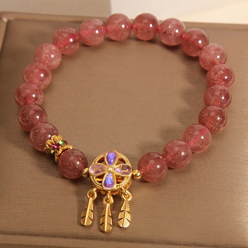 Natural strawberry quartz bracelet with four-leaf clover dream catcher ball pendant on adjustable string