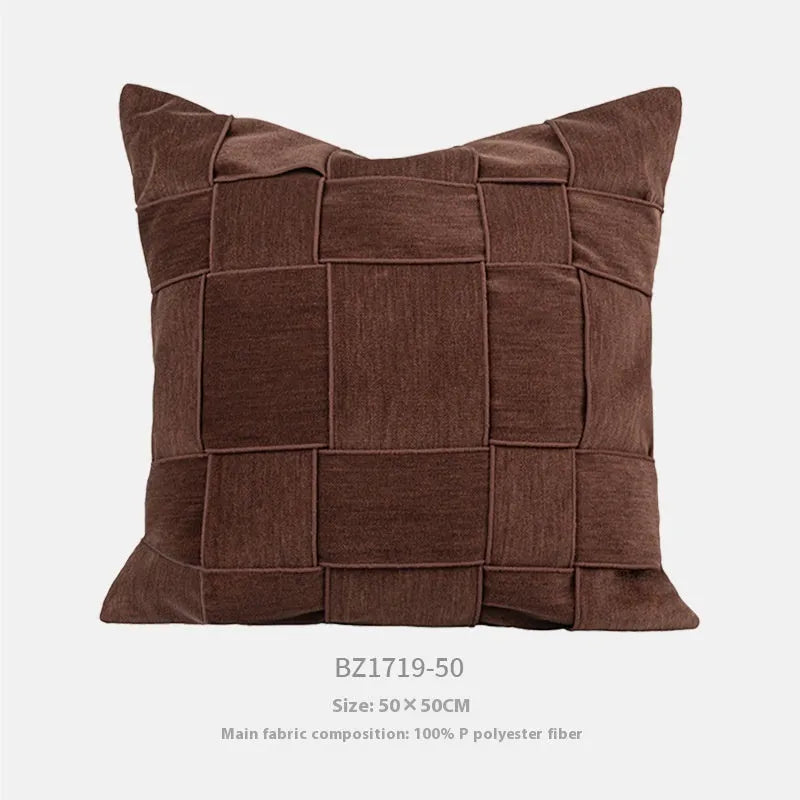 Square chenille woven cushion in a choice of seven colours on a sofa, showing its 50x50cm size and textured fabric.