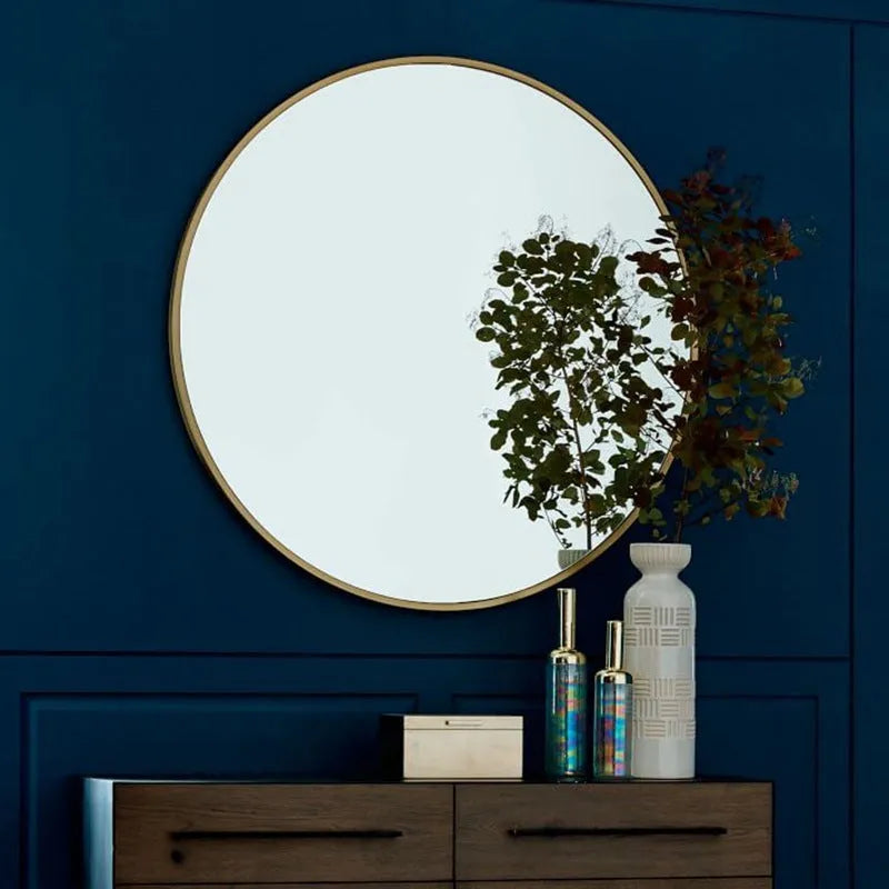 Round iron bathroom wall mirror in black finish, 30cm or 60cm diameter, hanging on a tiled wall for dressing and makeup use