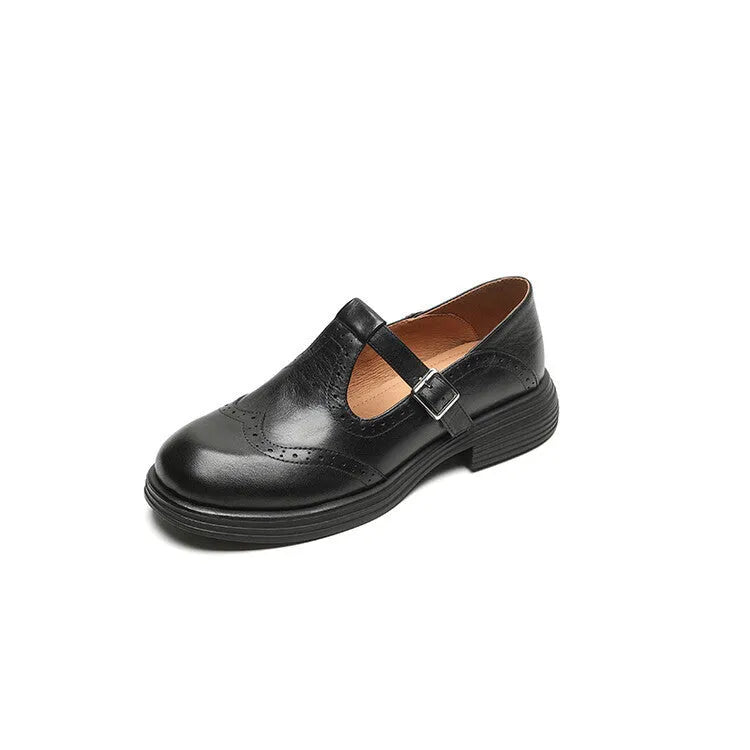 Women's flat British style sheepskin shoes in black with round toe and solid colour finish