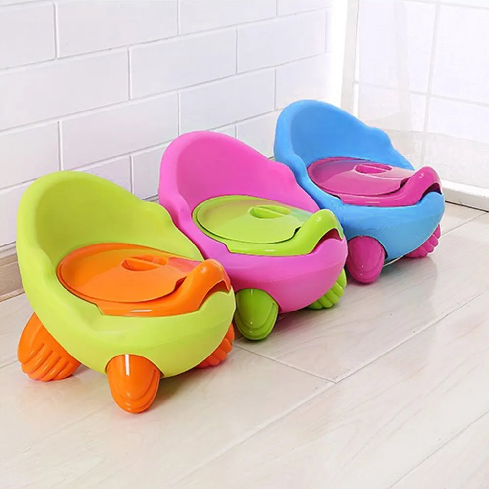 Dandan cartoon baby toilet training potty stool in assorted colours on a white background.