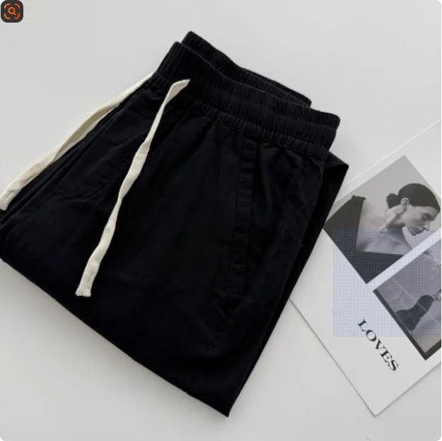 Men's loose straight casual pants in beige colour with drawstring waistband