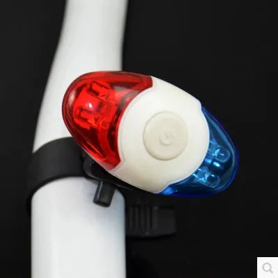 Red and blue LED tail light with adjustable mounting base showing horizontal and vertical positioning options