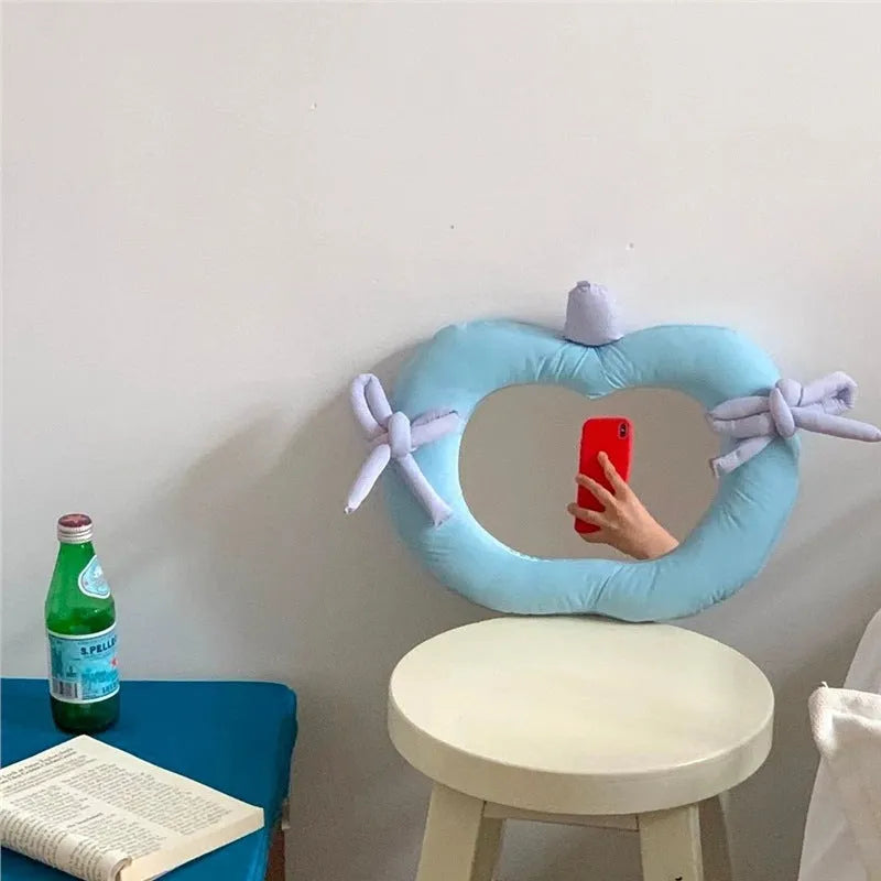 Korean-style decorative wall mirror with cotton-filled fabric backing in apple green colour