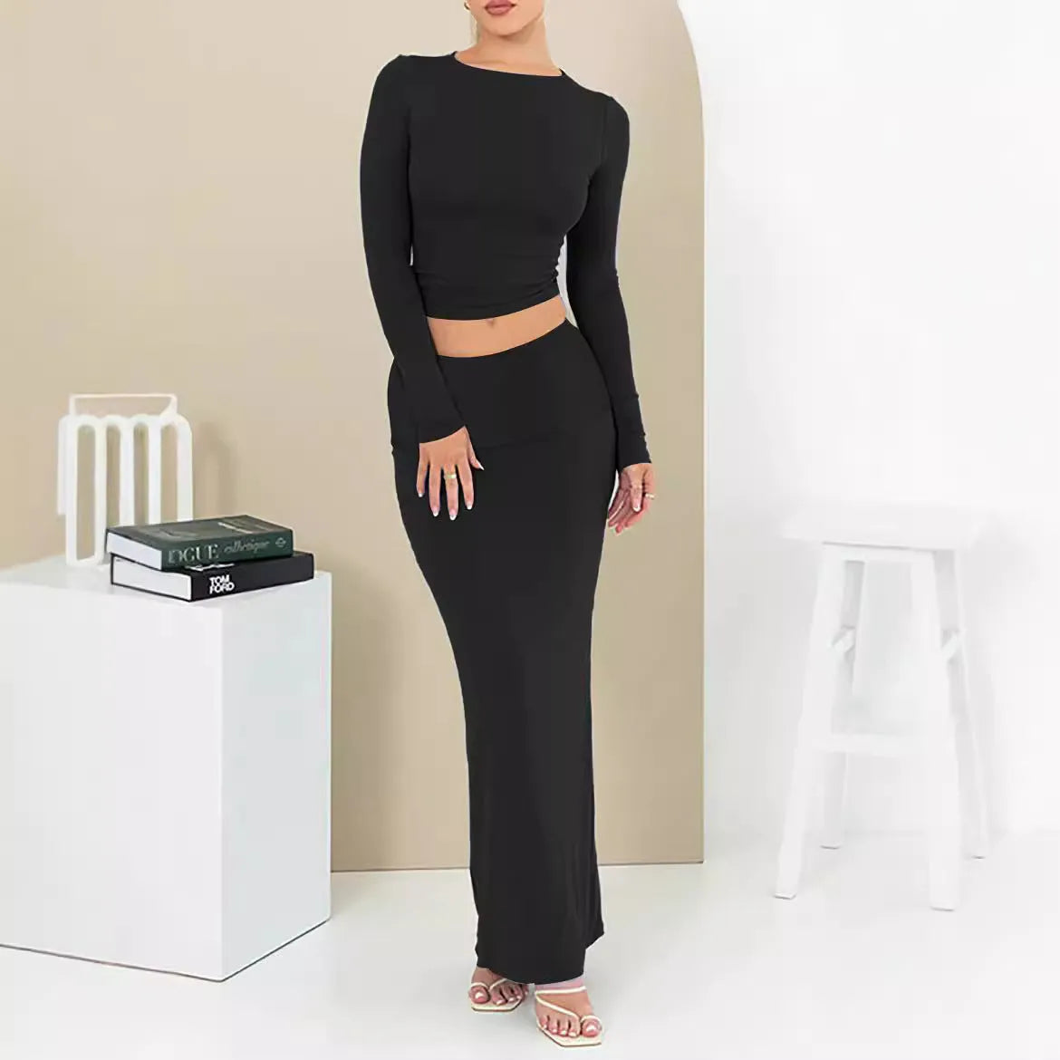 Women's slim fit autumn two-piece suit set in a sweet style with a long skirt and exposed navel top.