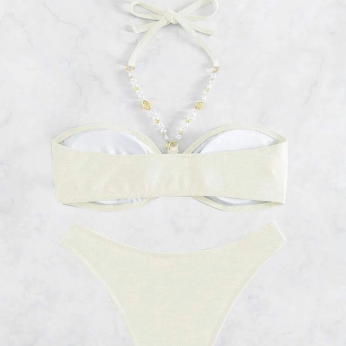 Solid colour halter women's bikini set in green, polyester fabric, available in sizes S, M, L Asian sizing