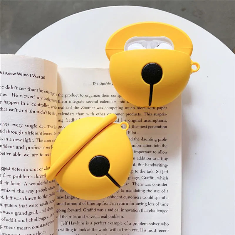Bright yellow silicone case with a bell charm for Apple AirPods 1 and 2 generation.