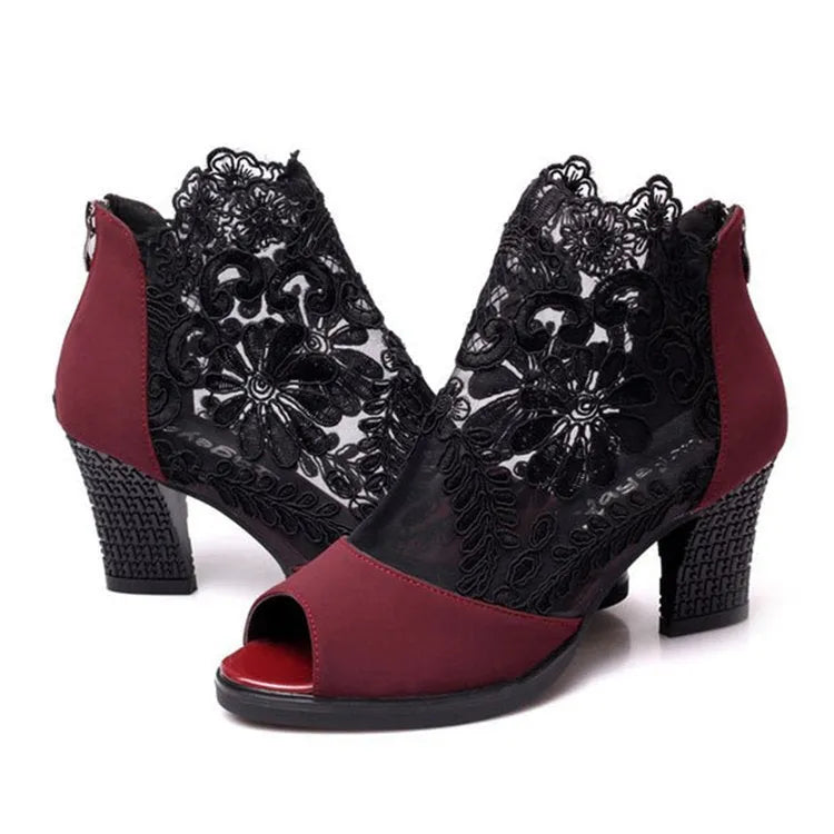 Lucyever women's black lace gladiator sandals with a zip closure and square high heel on a white background.