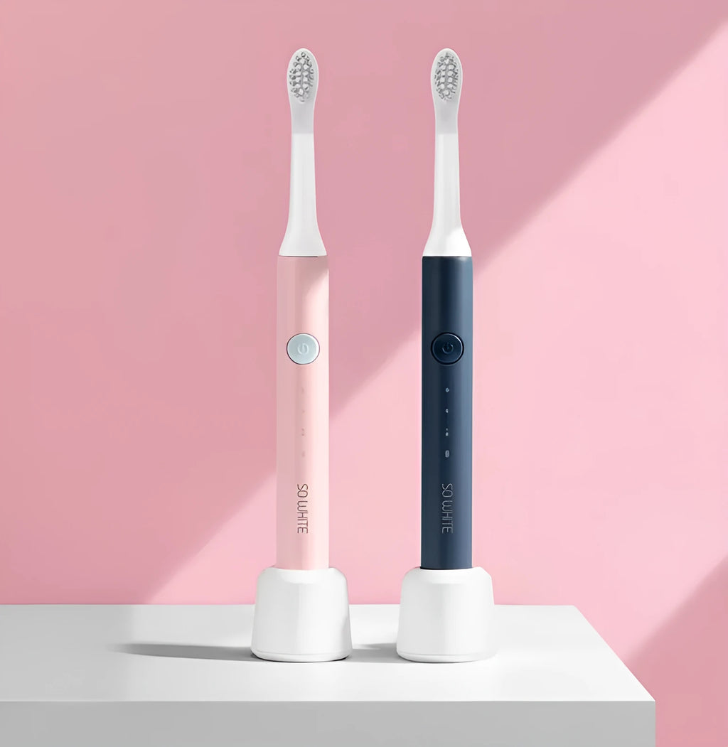 Sonic electric toothbrush with round brush head in blue, IPX7 waterproof handle with power button