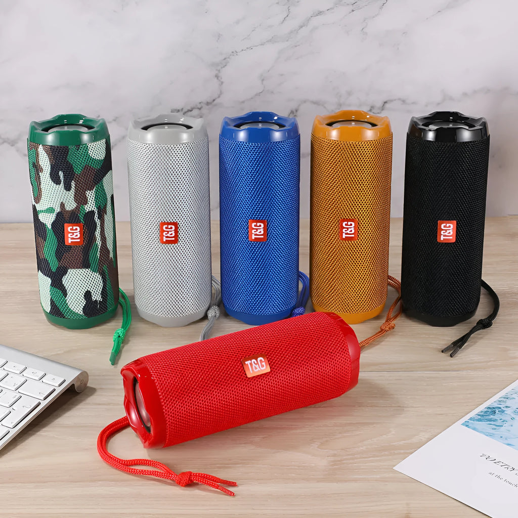 Fabric-covered portable Bluetooth speaker with integrated card holder in multiple colour options