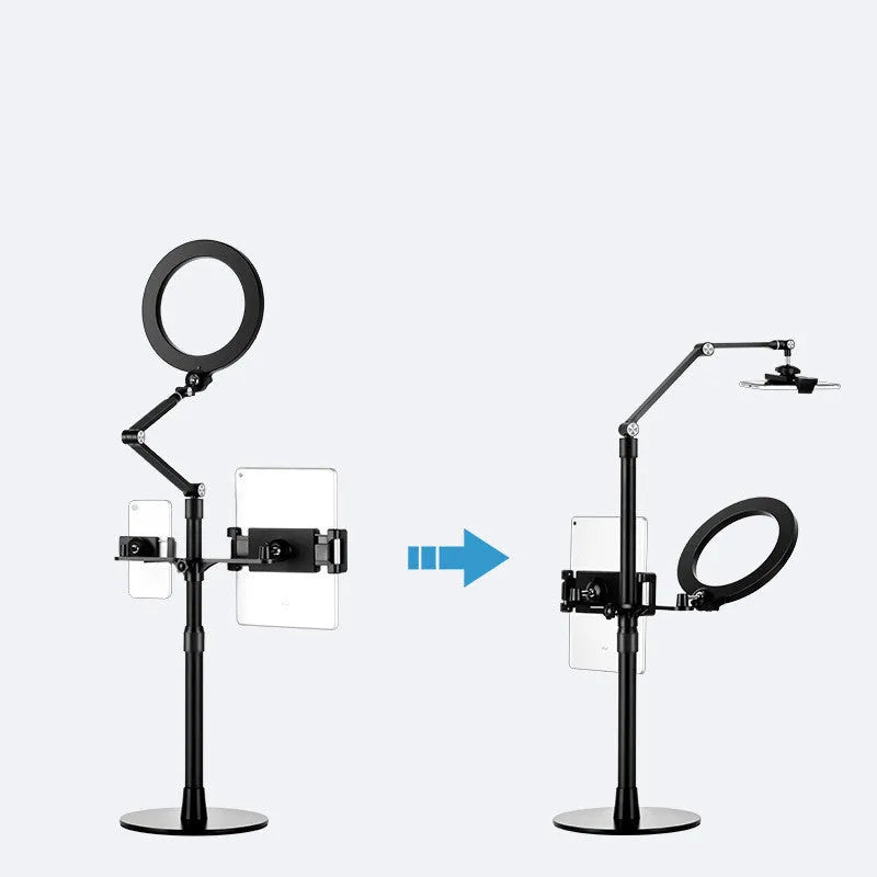 Black aluminium alloy and ABS mobile phone tablet stand with built-in fill light, folded vertical orientation on a table