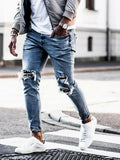 Men's light blue straight fit jeans with worn and embroidered detailing, five-point length, mid-rise waist