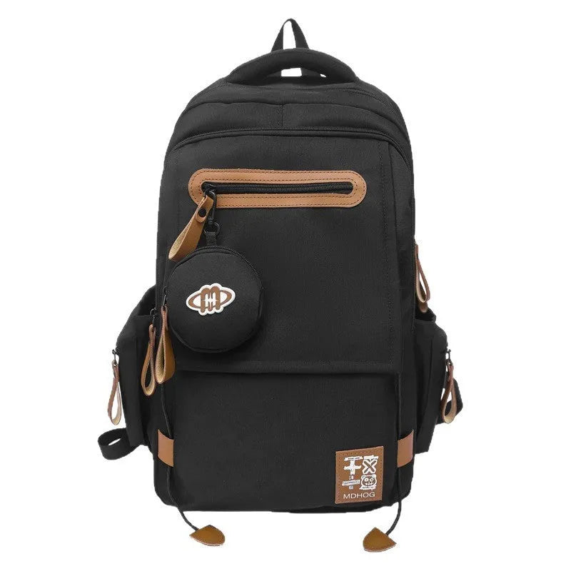 Japanese large capacity leisure travel backpack in black nylon with contrast stitching and waterproof finish