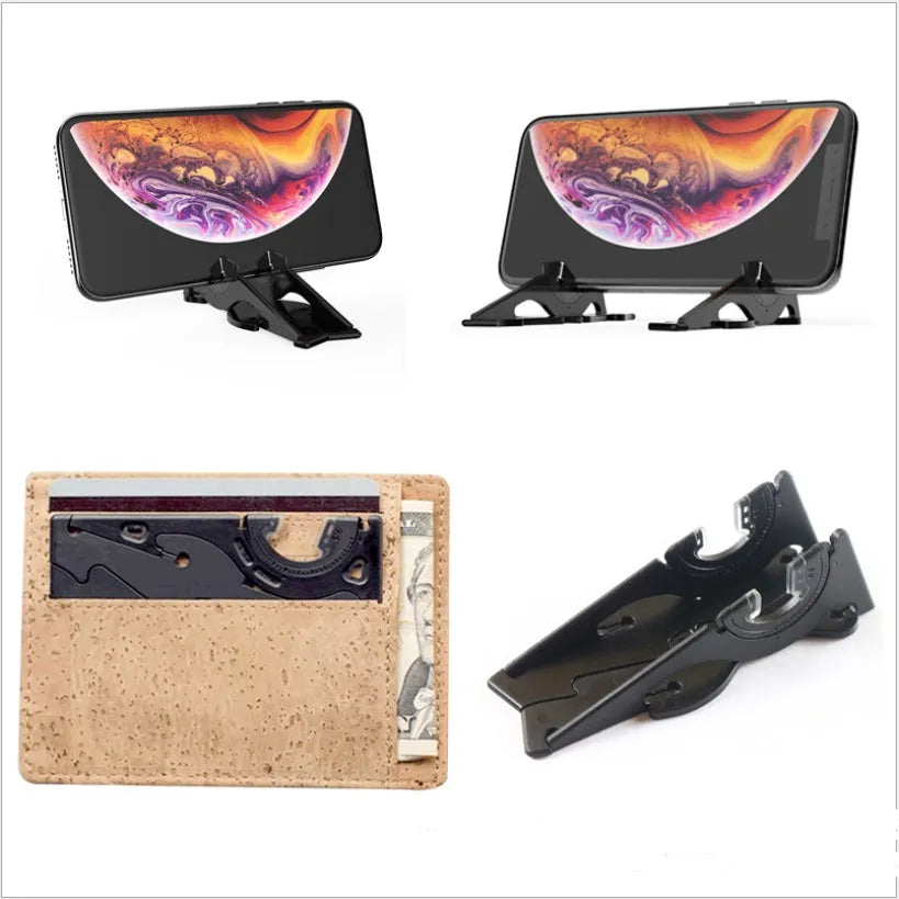 Black plastic card type mobile phone holder with adjustable bracket on desktop