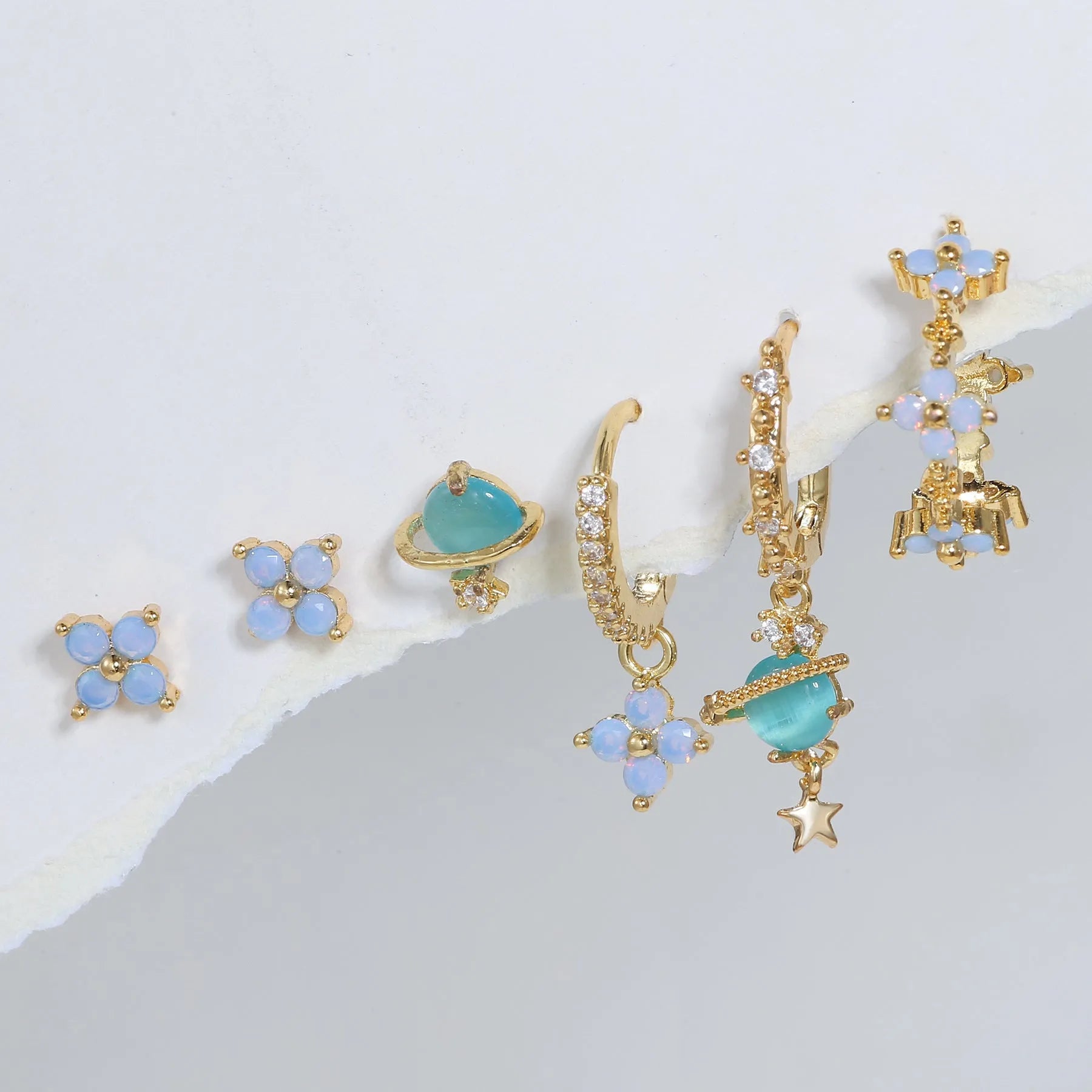 Japanese Korean style floral stud earrings with zircon detailing in gold or silver finish