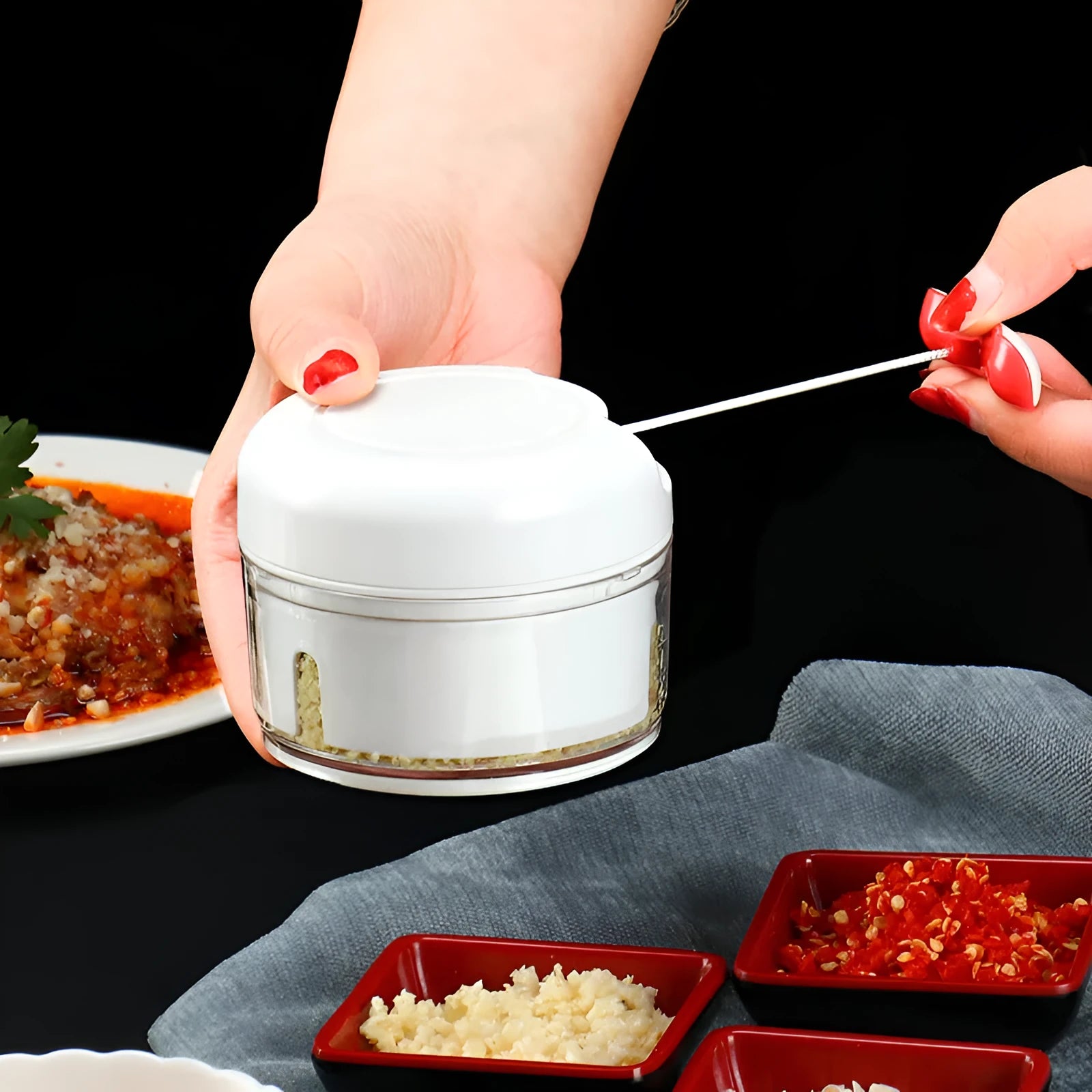 White manual food chopper with 304 stainless steel blades and magnetic attachment, 8.5 x 7 cm size