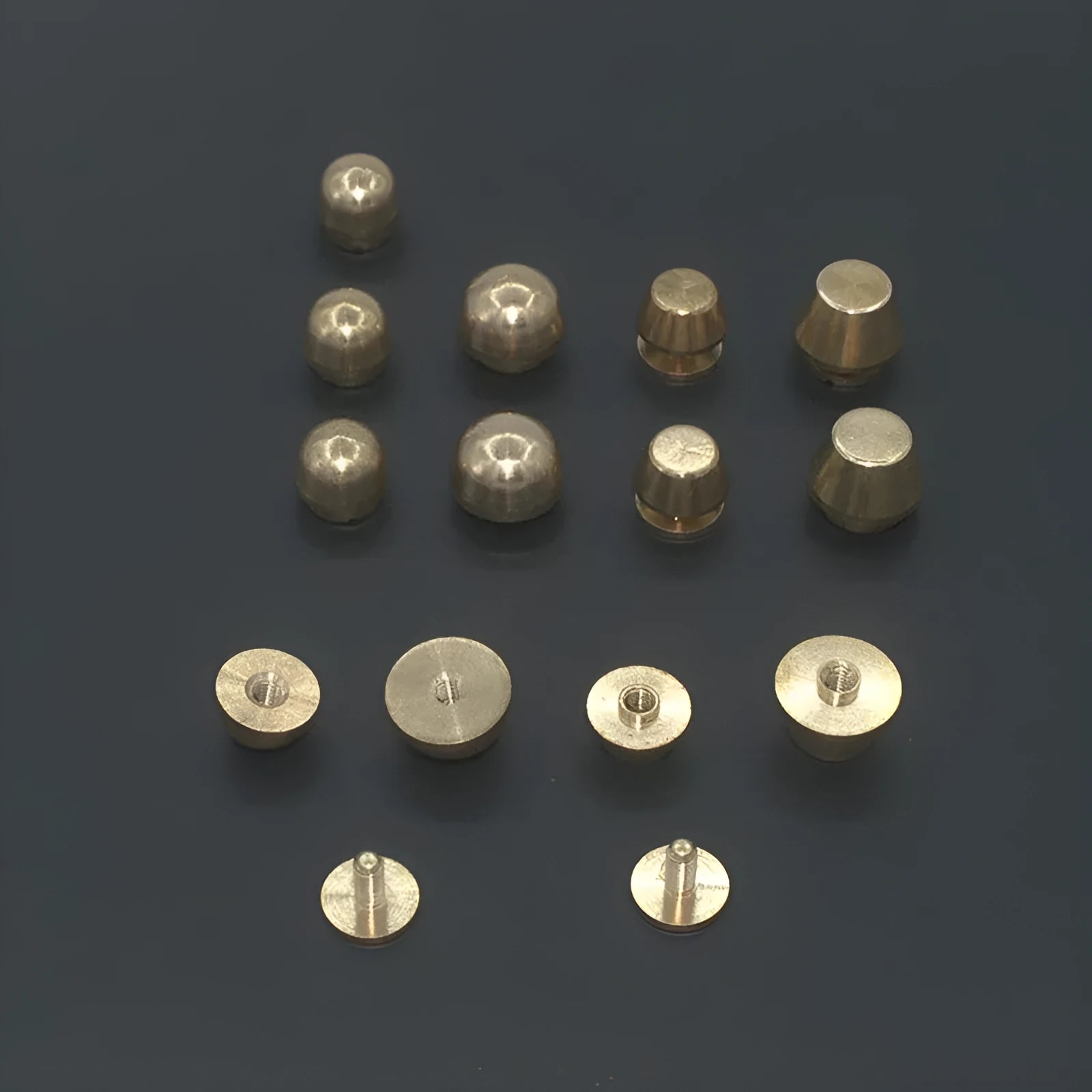 Brass decorative buckle with antique foot nail design in four size variations