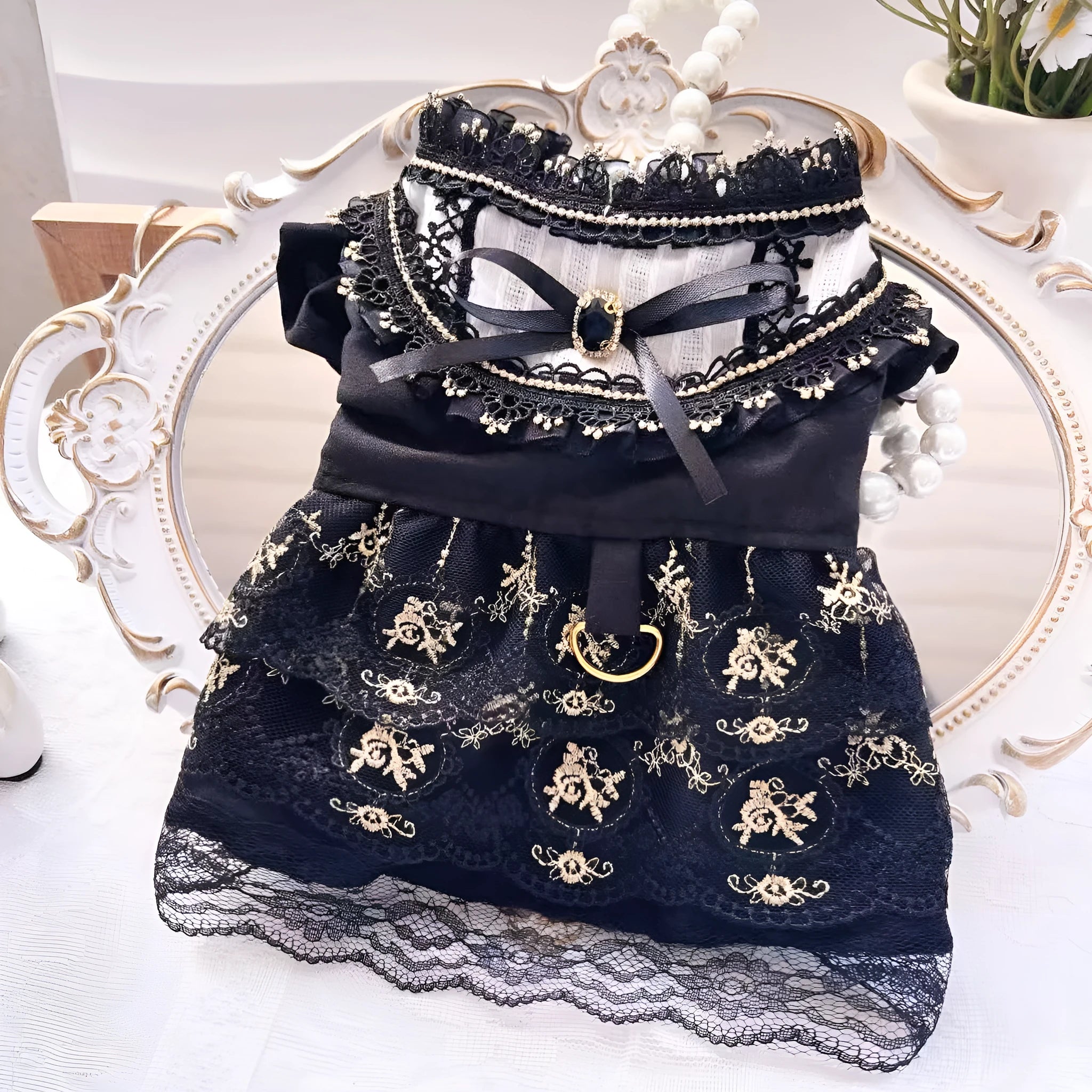 Golden gothic princess-style skirt for a small dog or cat on a mannequin.