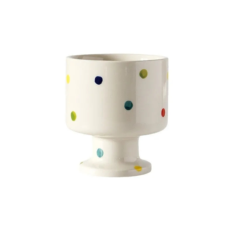 Hand-pinched irregular shaped ceramic mug in solid colour with 250ml capacity