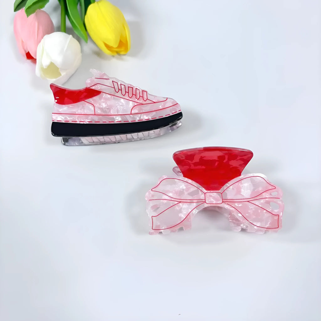 Acrylic bow tie hair grip in cream with glitter oil injection finish, 8cm long, for women