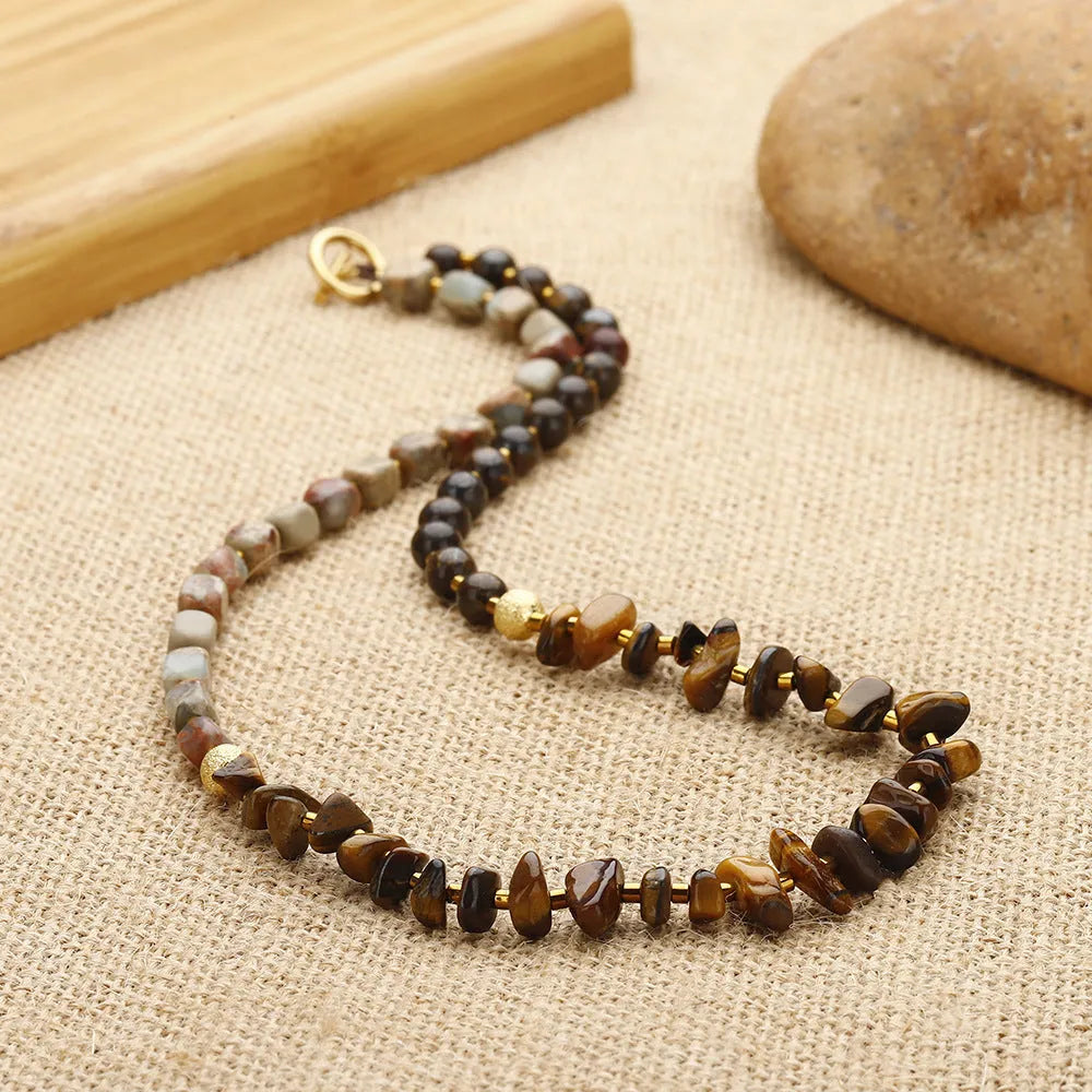 Natural tigereye bronze geometric bracelet with simple unisex style on neutral background