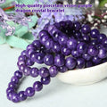 Natural transparent charoite crystal bracelet with platinum-plated fittings showing clear beads