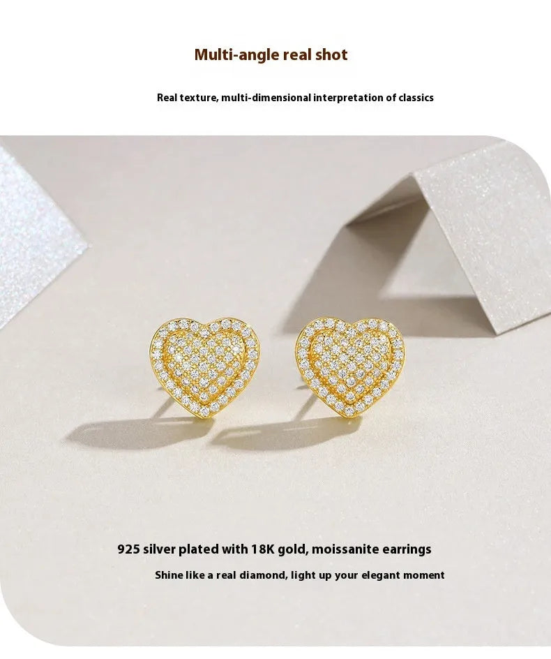 Pair of golden heart-shaped moissanite stud earrings on S925 silver posts